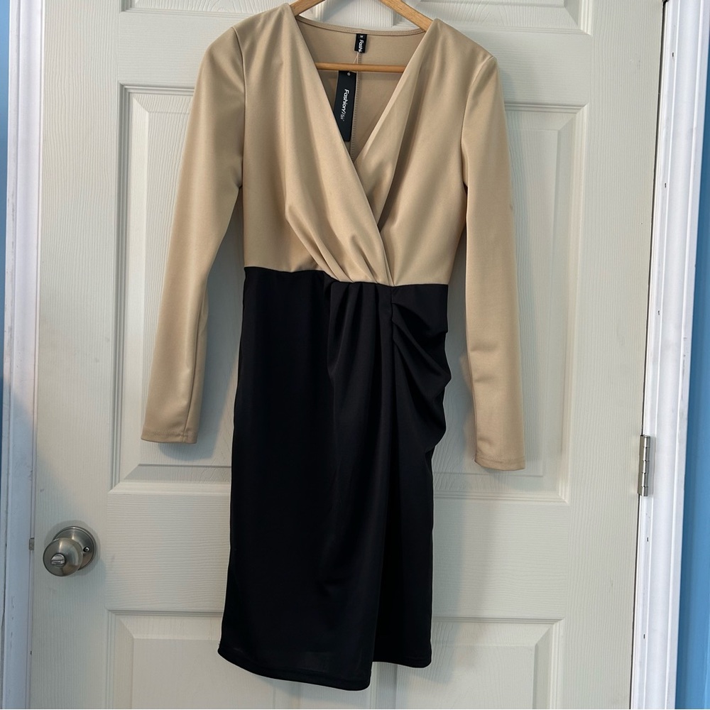 Fashion Mia Medium long sleeve dresss in blackly and tan. New with tags